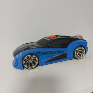 Coche de juguete con luces y movimiento