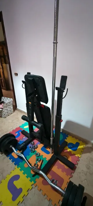 Banco musculación + juego pesas