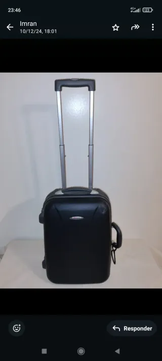 Maleta de viaje negra con ruedas