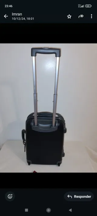 Maleta de viaje negra con ruedas