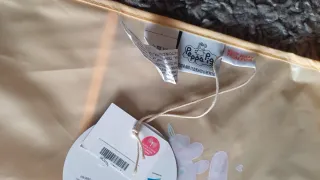 Babero Peppa Pig con bolsillo