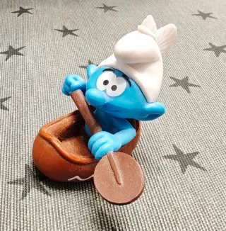 Figura Pitufo Peyo Indio y indio en canoa.