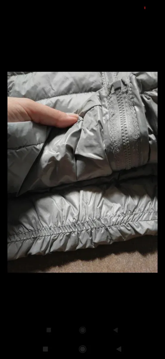 Chaqueta acolchada gris con capucha, 100% plumas