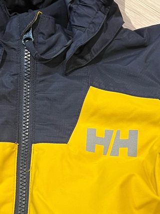 Chaqueta Helly Hansen Talla 7 amarilla y azul.