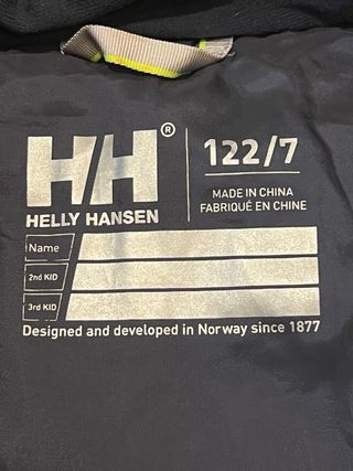 Chaqueta Helly Hansen Talla 7 amarilla y azul.