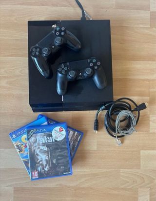 PS4 (PlayStation 4) con 2 mandos y juegos