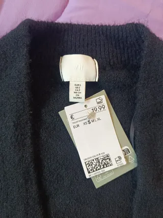 Chaqueta larga de punto H&M