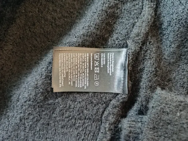 Chaqueta larga de punto H&M