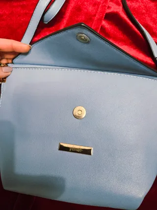 Borsa pochette a busta celeste