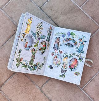 Album fotografico vittoriano con fate e fiori