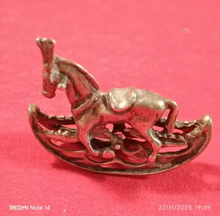 Miniatura cavallo a dondolo in argento