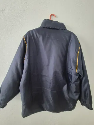 Chaqueta FC Barcelona reversible azul y amarilla