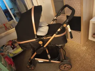 Carro de bebé negro y bronce 3 posiciones