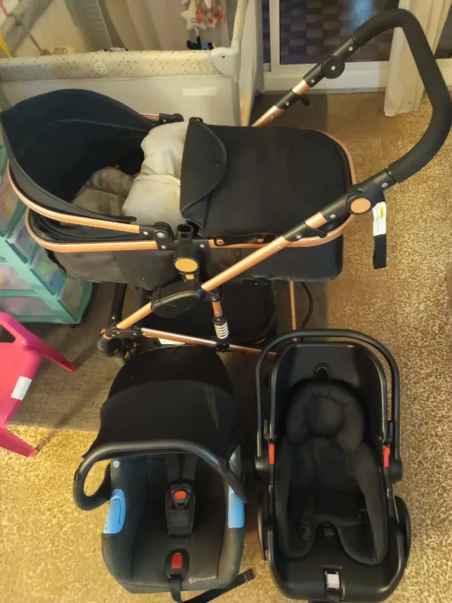 Carro de bebé negro y bronce 3 posiciones