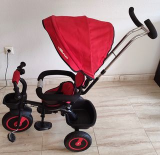 Triciclo rojo con capota y asa