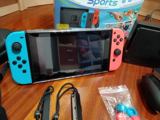 Nintendo Switch + Juegos y Accesorios