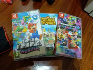 Nintendo Switch + Juegos y Accesorios