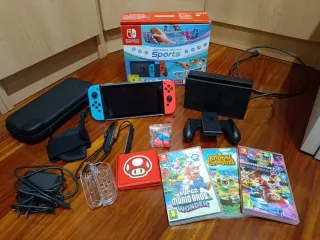 Nintendo Switch + Juegos y Accesorios