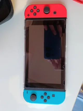 Nintendo Switch + Juegos y Accesorios
