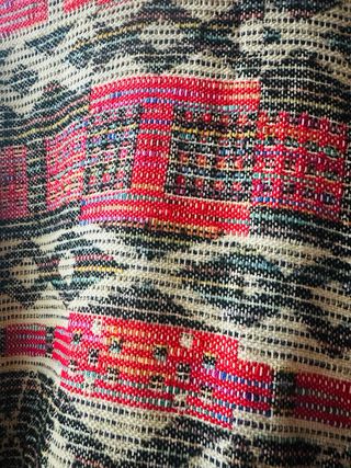 Chaqueta tejida multicolor con flecos