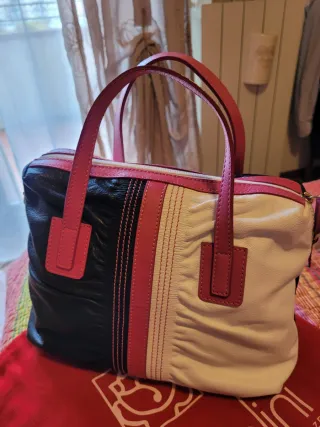 Borsa in pelle nera, bianca e fucsia