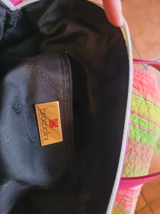 Borsa in pelle nera, bianca e fucsia