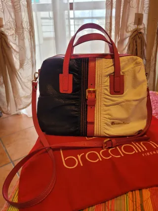 Borsa in pelle nera, bianca e fucsia