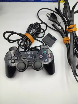 PlayStation 2 con scatola originale + 4 giochi