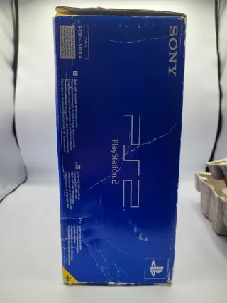 PlayStation 2 con scatola originale + 4 giochi