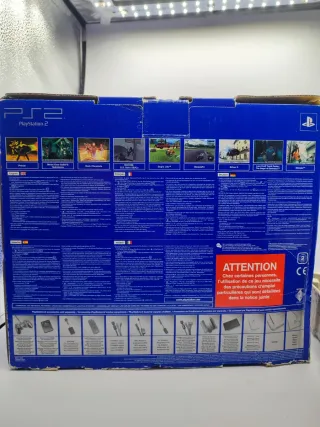 PlayStation 2 con scatola originale + 4 giochi