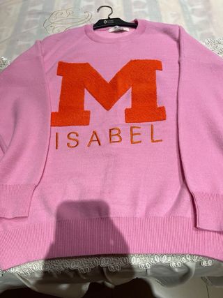 Jersey rosa con letra M naranja
