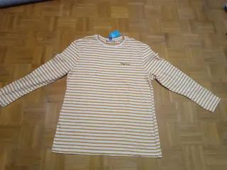 Camiseta de rayas blanca y amarilla