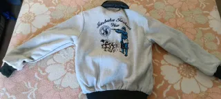 Chaqueta reversible verde y gris.