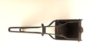 Antigua prensa manual de cocina