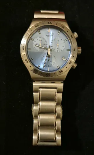 Reloj Swatch modelo YVS528G Azul y Plateado