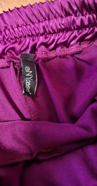 Completo top e pantaloni viola