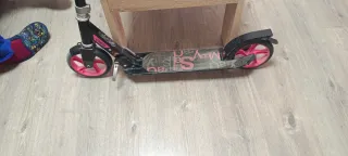 Patinete Oxelo rosa y negro