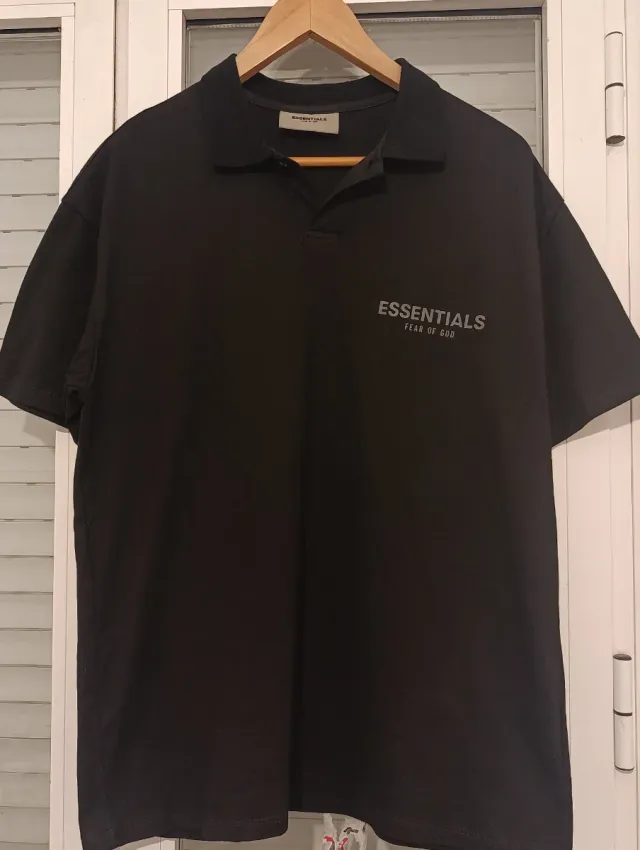 Polo ESSENTIALS Negro Reflectante