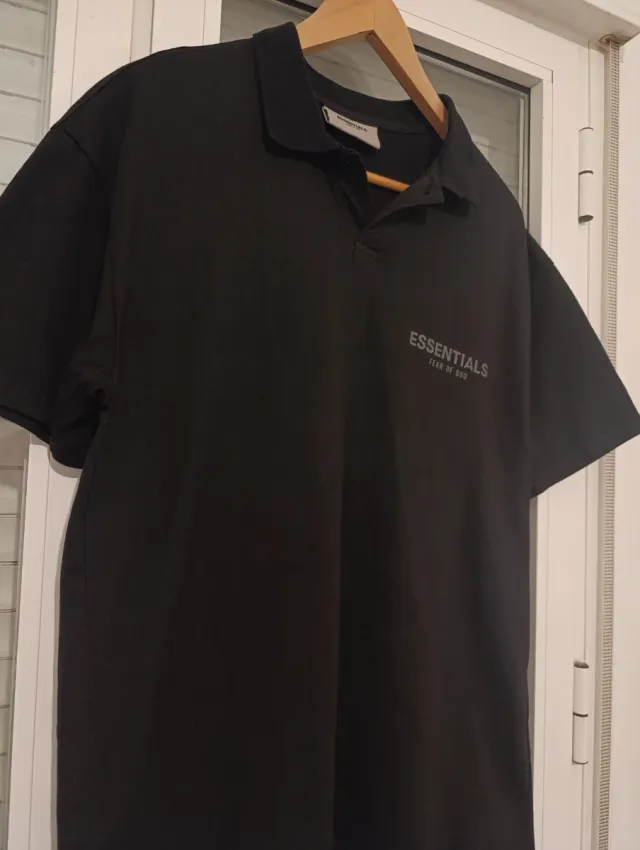Polo ESSENTIALS Negro Reflectante