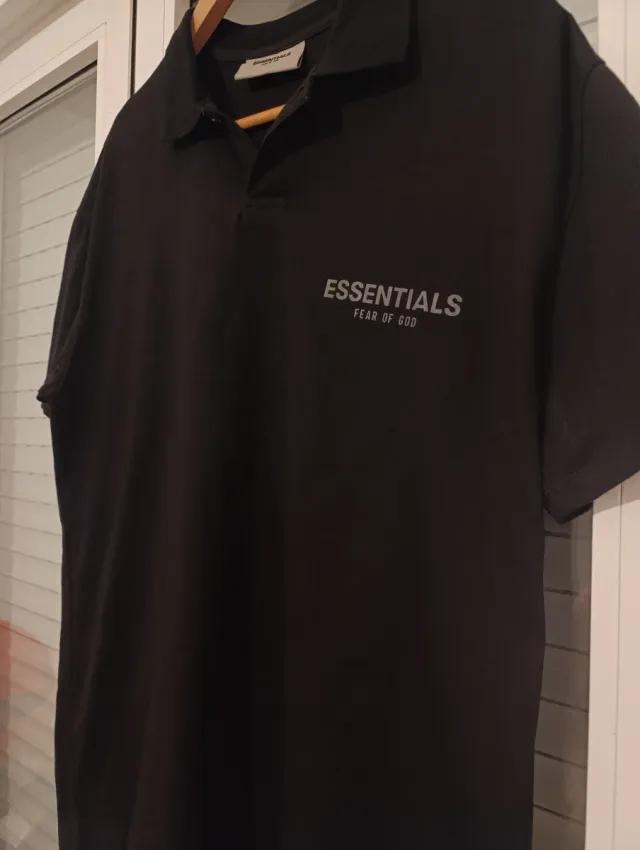 Polo ESSENTIALS Negro Reflectante