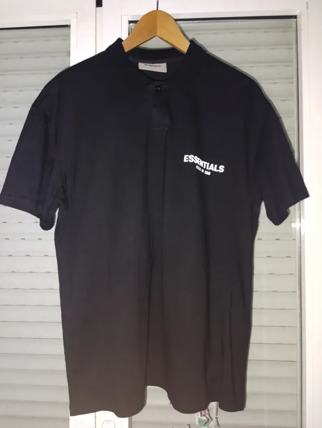 Polo ESSENTIALS Negro Reflectante