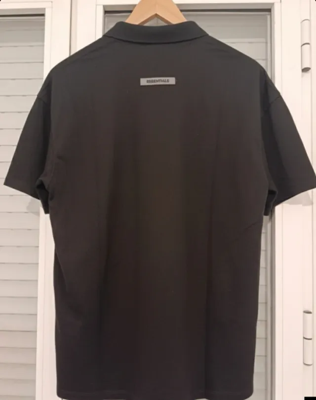 Polo ESSENTIALS Negro Reflectante