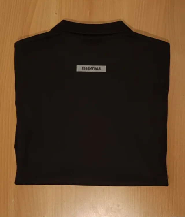Polo ESSENTIALS Negro Reflectante