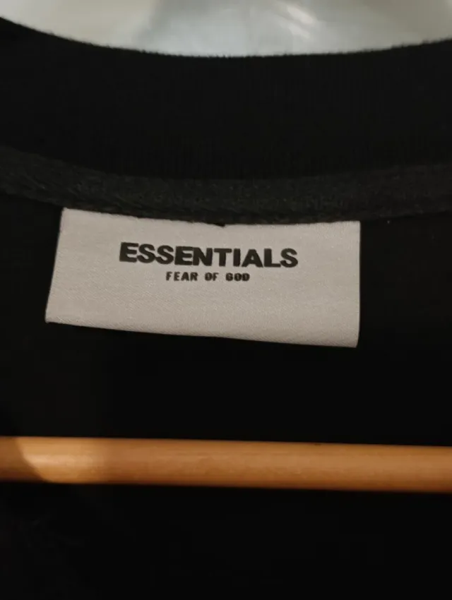 Polo ESSENTIALS Negro Reflectante