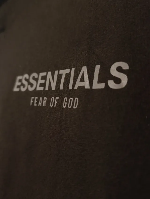 Polo ESSENTIALS Negro Reflectante