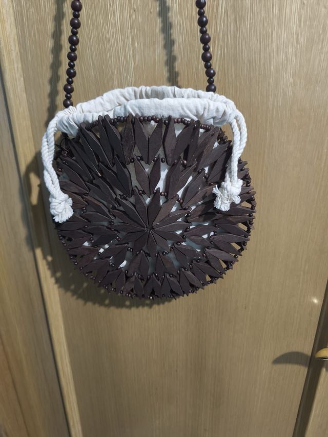 Bolso redondo Mango madera y tela