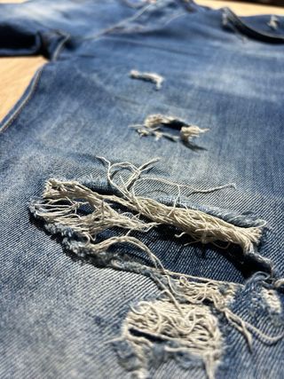 Jeans blu strappati slim fit taglia 44