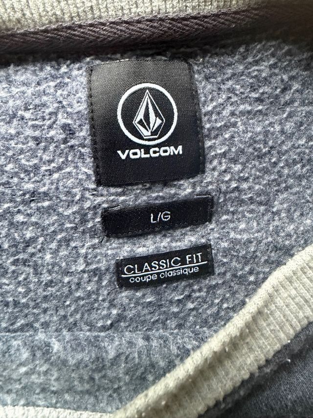 Sudadera Volcom azul y marrón con bolsillos