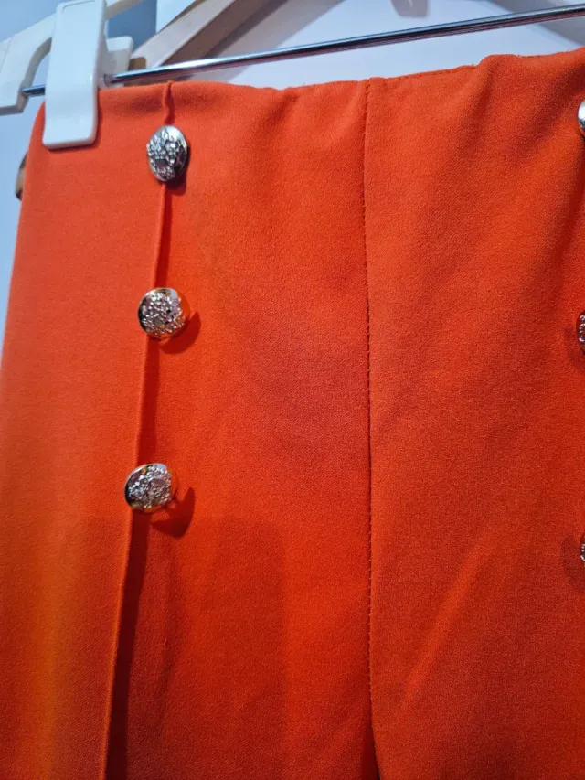 Pantalones acampanados Muse naranja