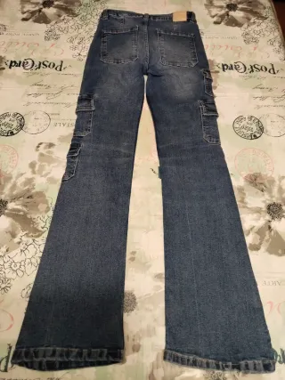 Pantalón vaquero niña flare cargo